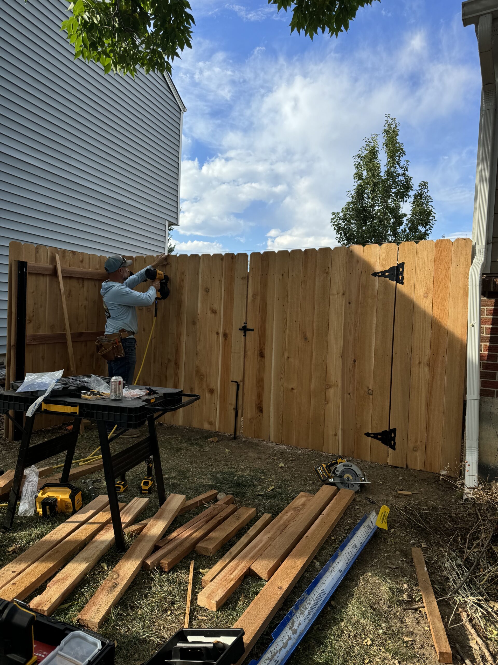 After fence replacement showing new professionally installed fence in Colorado