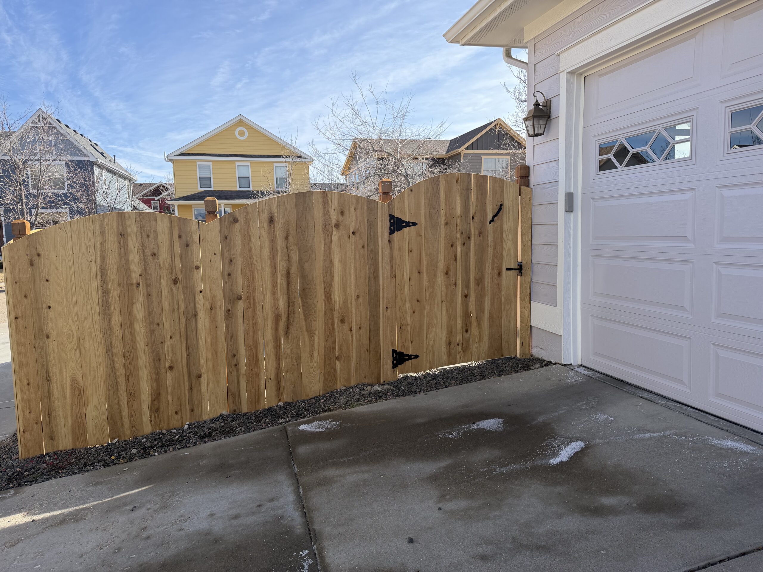 Cedar fence gate installation by Forever Fencing CO
