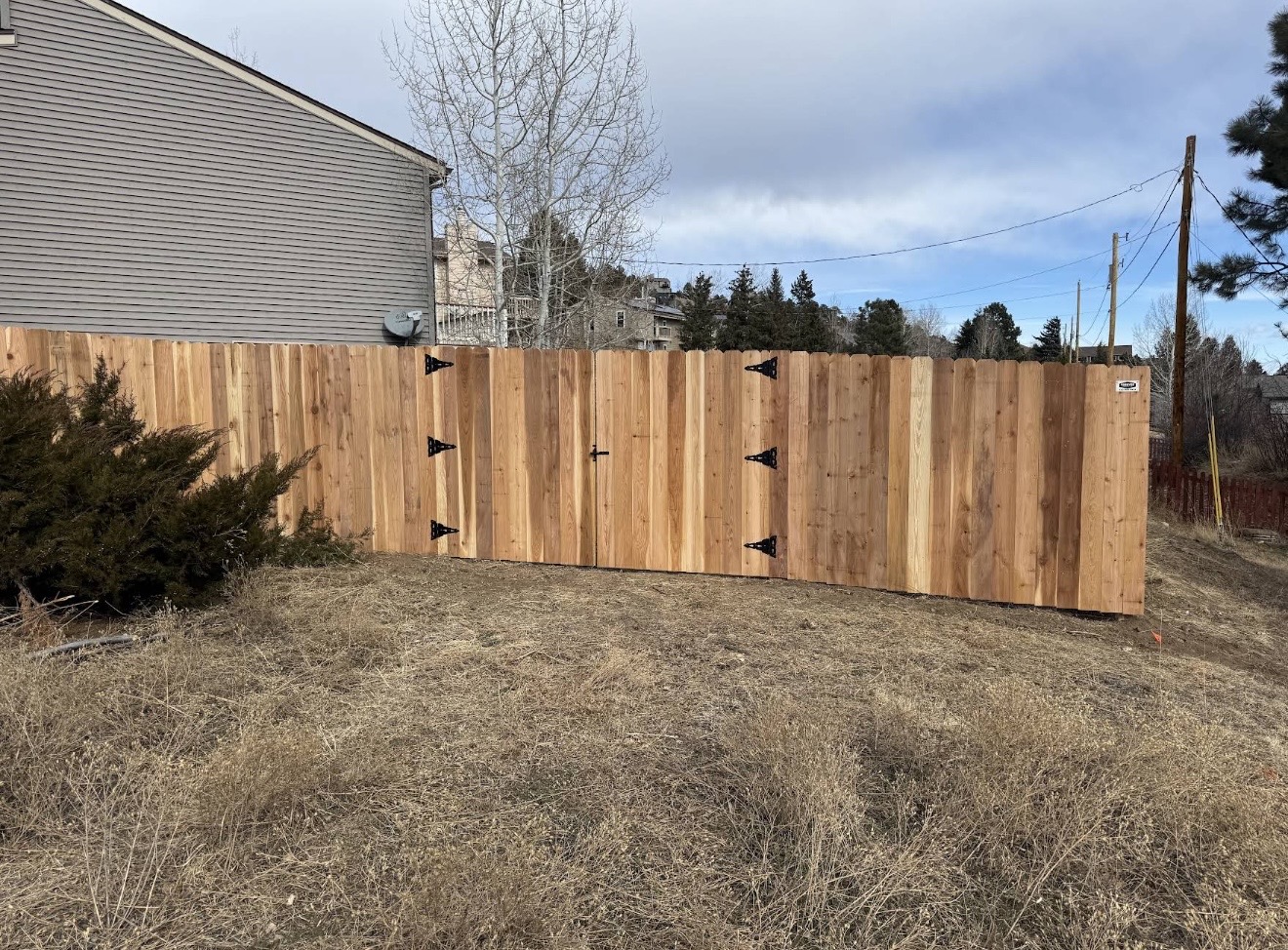 Cedar privacy fence installation in Evergreen Colorado