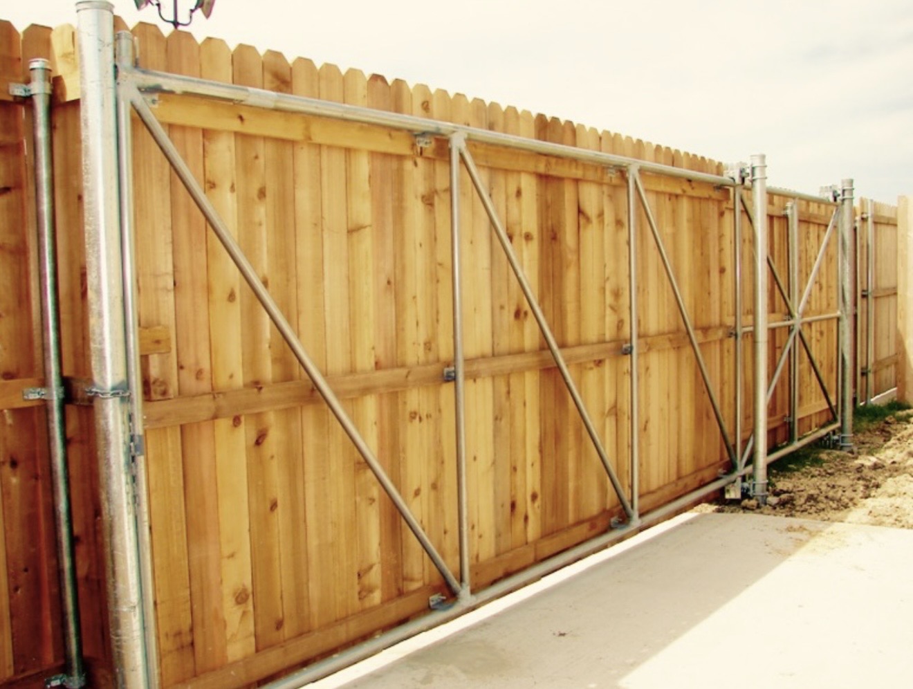 Custom fence gate installation in Colorado by Forever Fencing CO